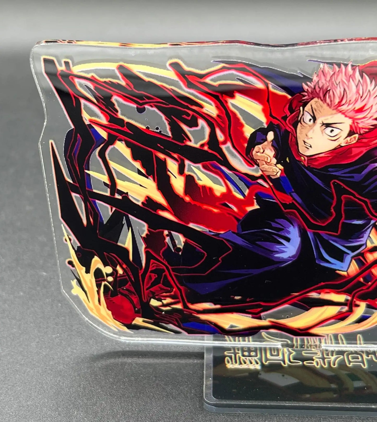 Close-up showing additional design details of Yuji Itadori acrylic stand