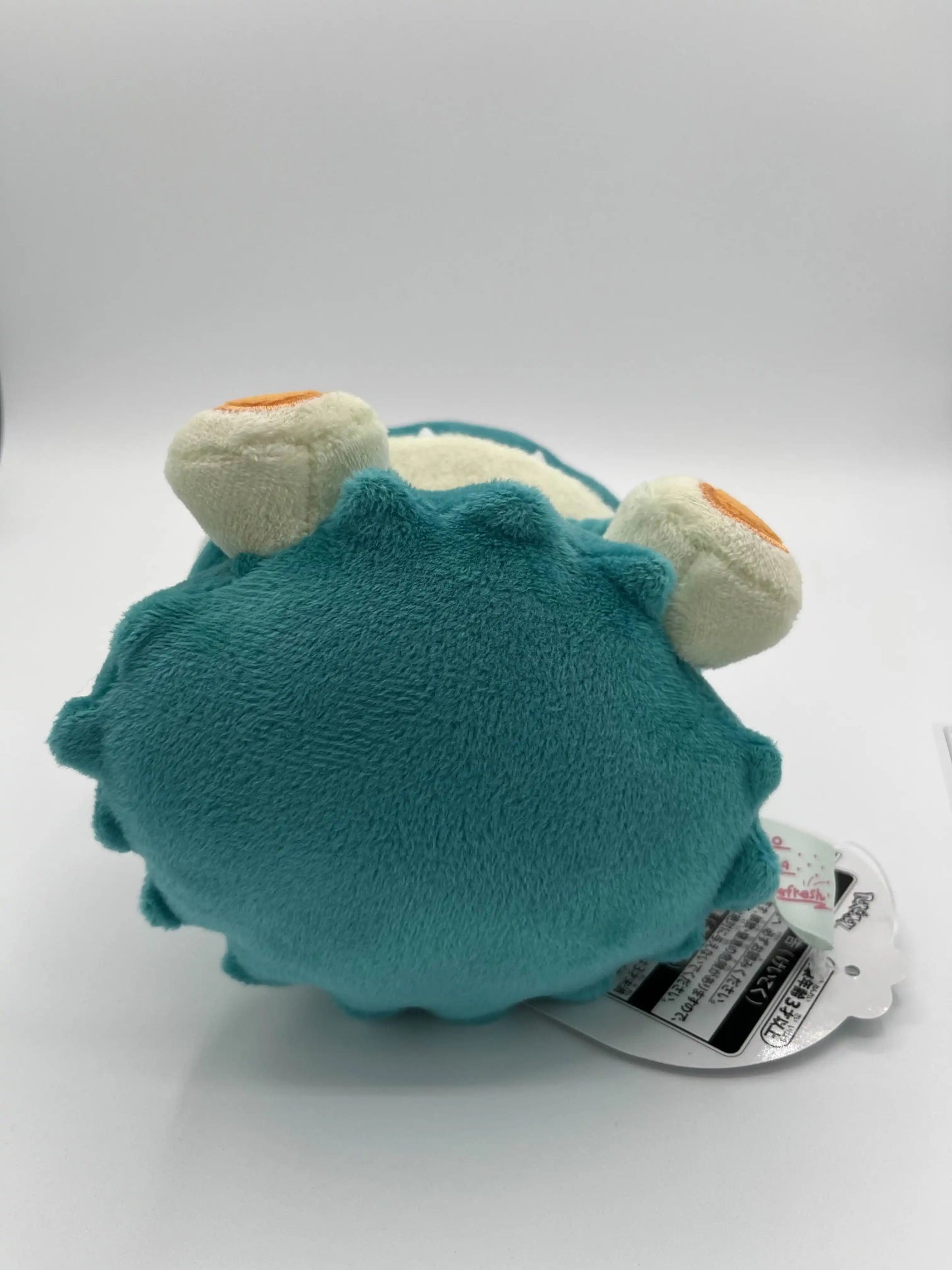 Bottom view of Pokémon Saiko Soda Pop Munchlax plush – Pokémon Center Japan
