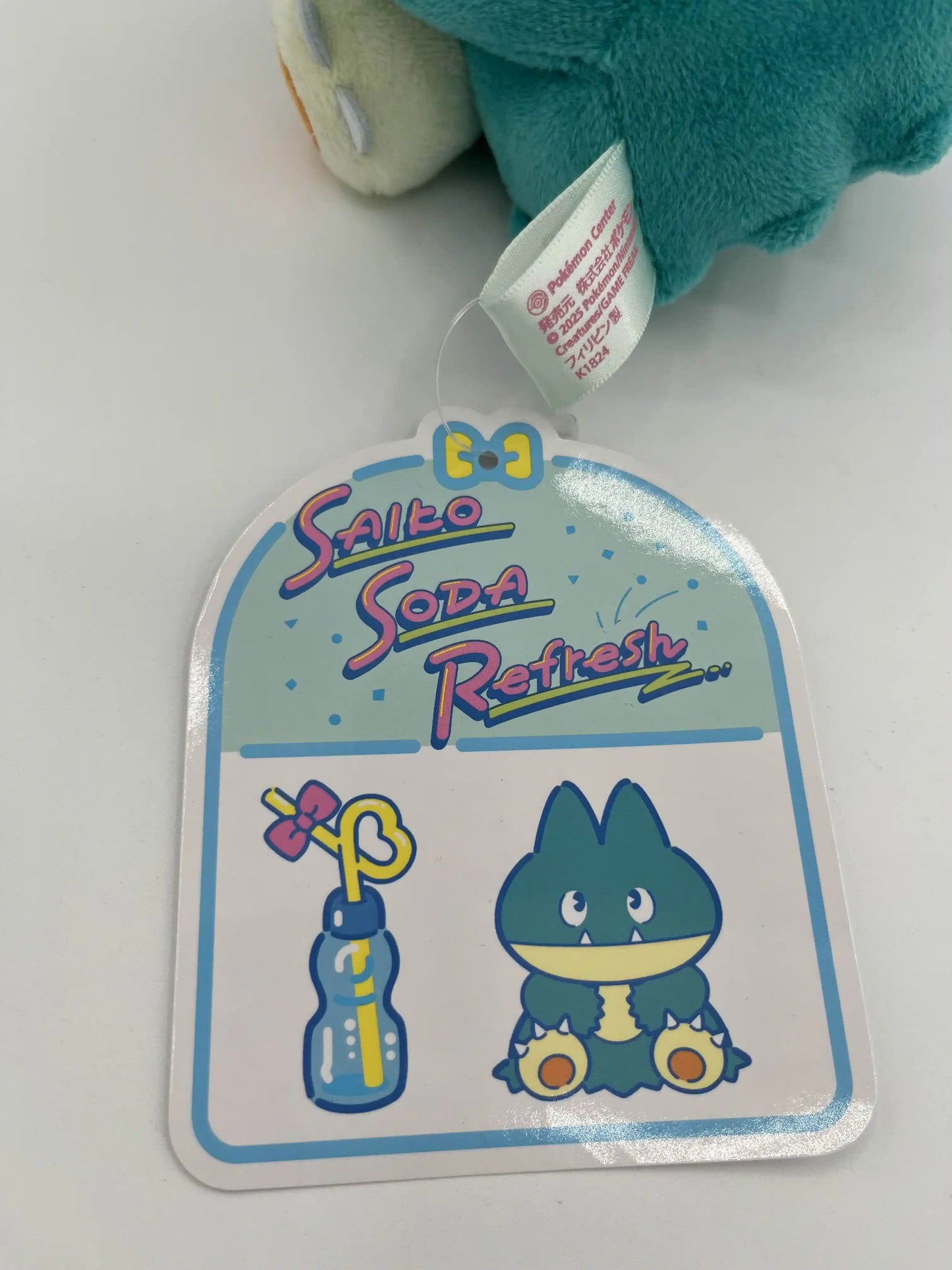 Official tag of Pokémon Saiko Soda Pop Munchlax plush – Pokémon Center Japan
