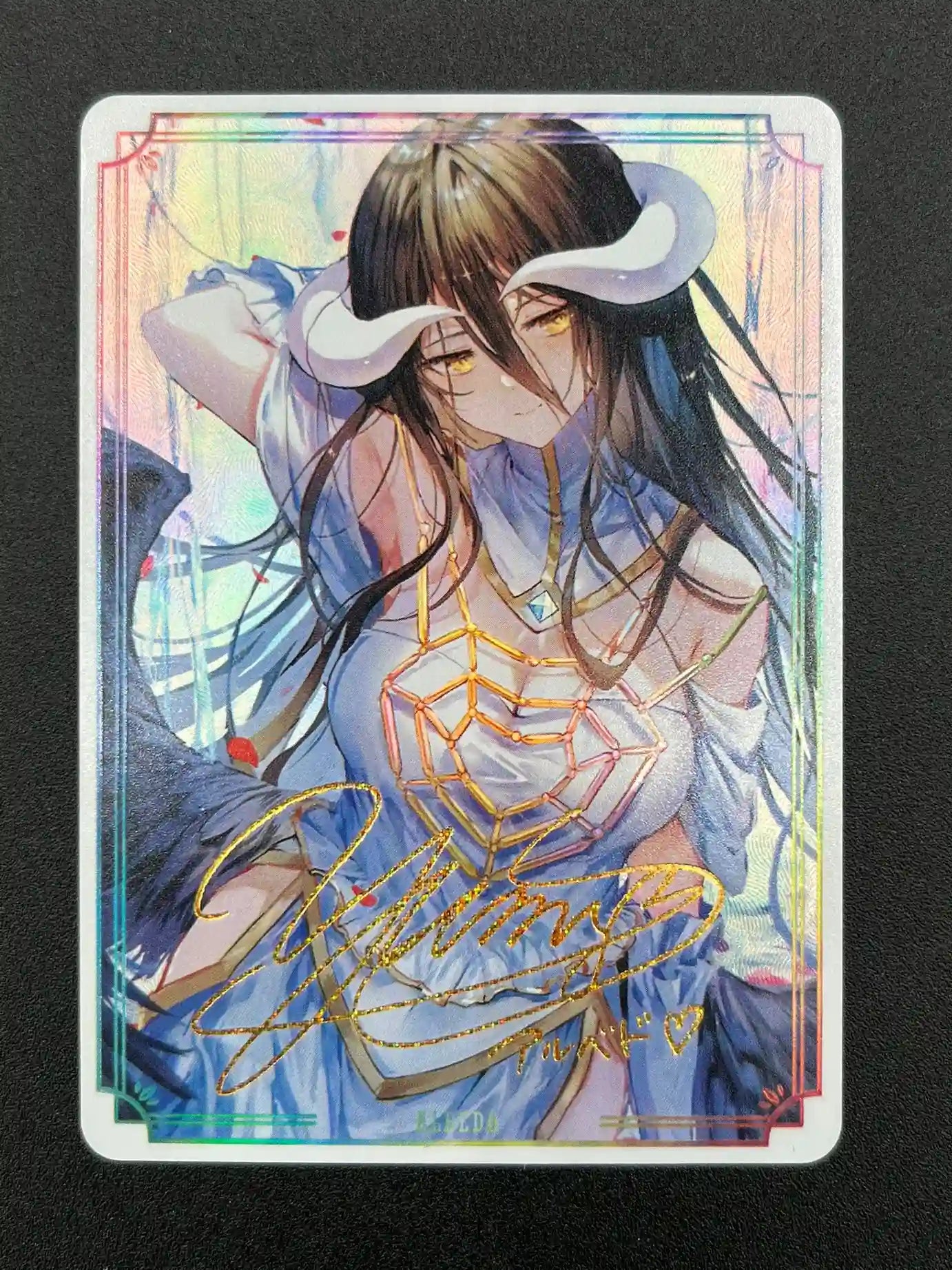 Detailed view highlighting foil and texture on Albedo Overlord Flash Gold Signature Rare card