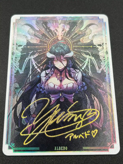 Close-up detail of artwork and gold foil signature on Albedo Overlord Waifu Collector Card