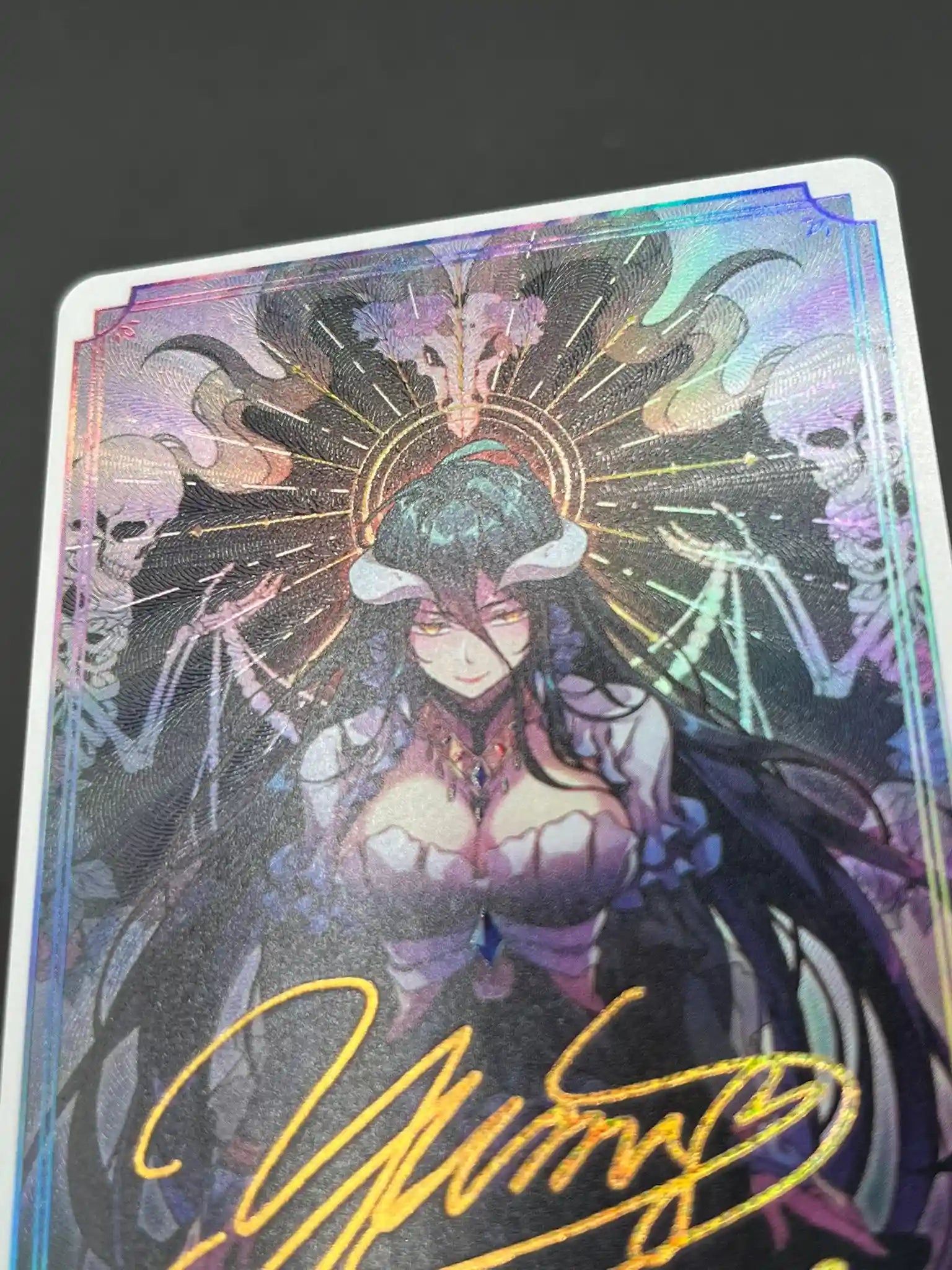Detailed view highlighting the holographic effects and foil on Albedo Overlord Waifu Collector Card