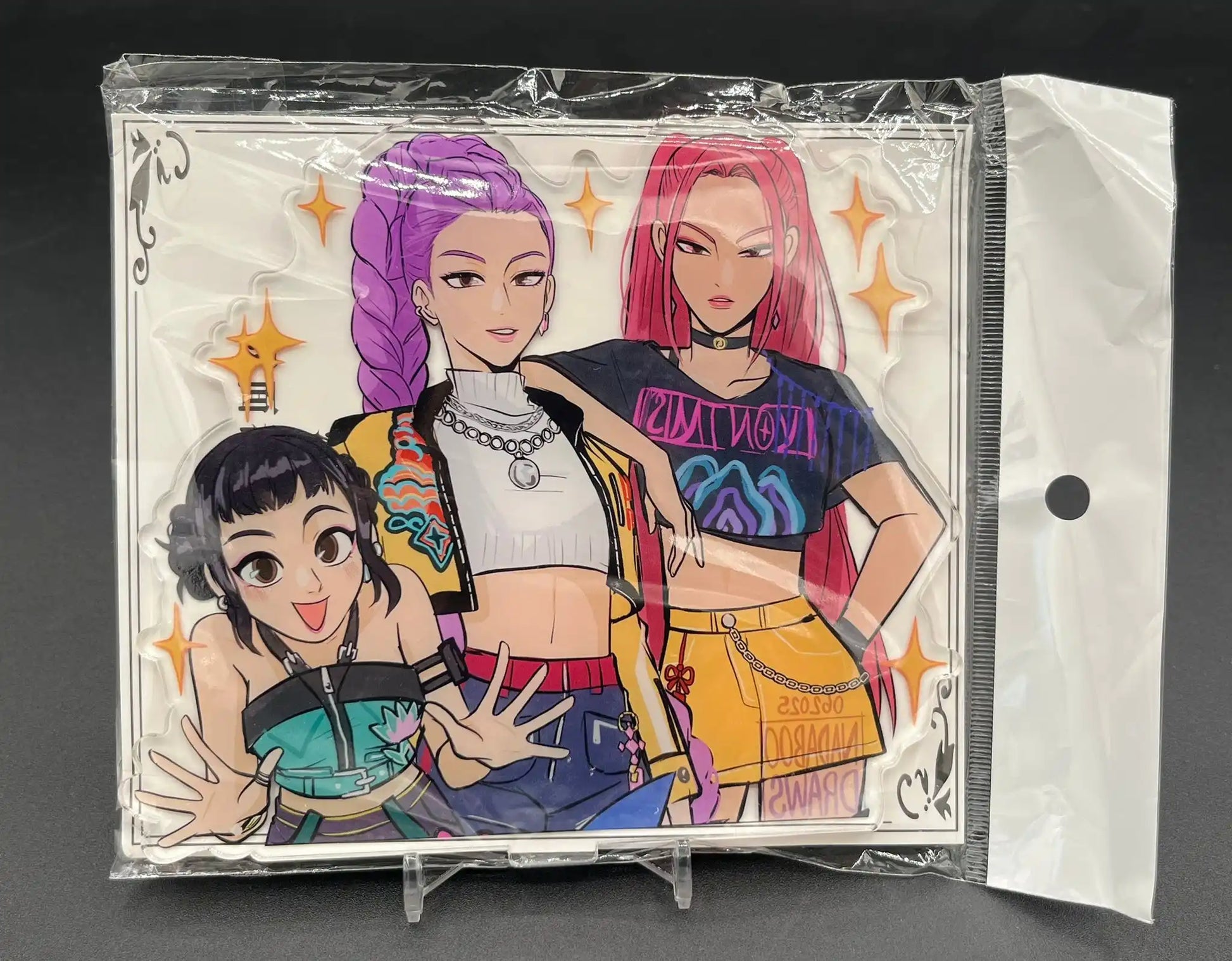 Front view of Huntr/X Huntrix Kpop Demon Hunter Girl Support Acrylic Figure Version 2 in packaging