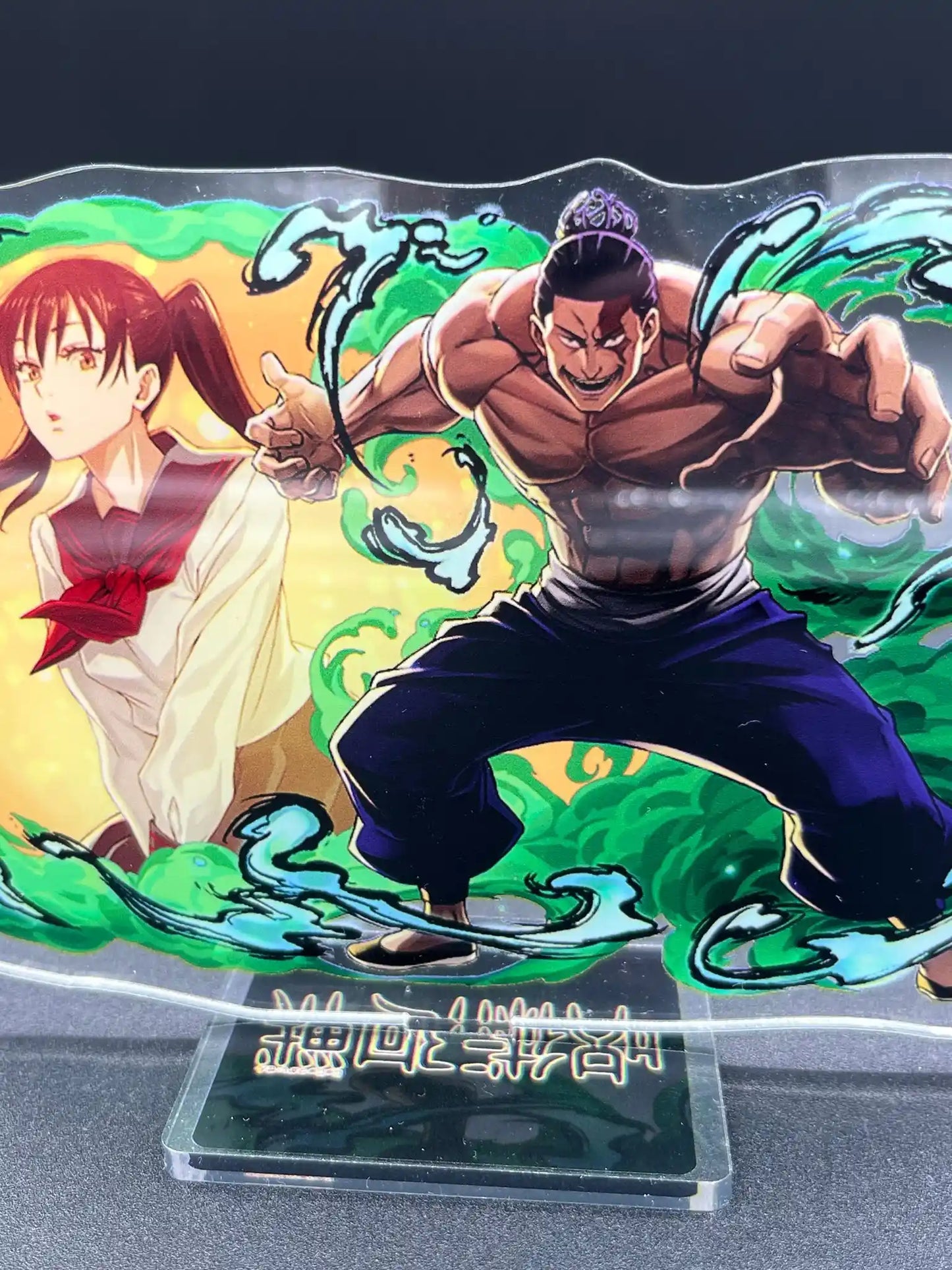 Detailed view highlighting the artwork on the Aoi Todo and Nobuko Takada acrylic stand