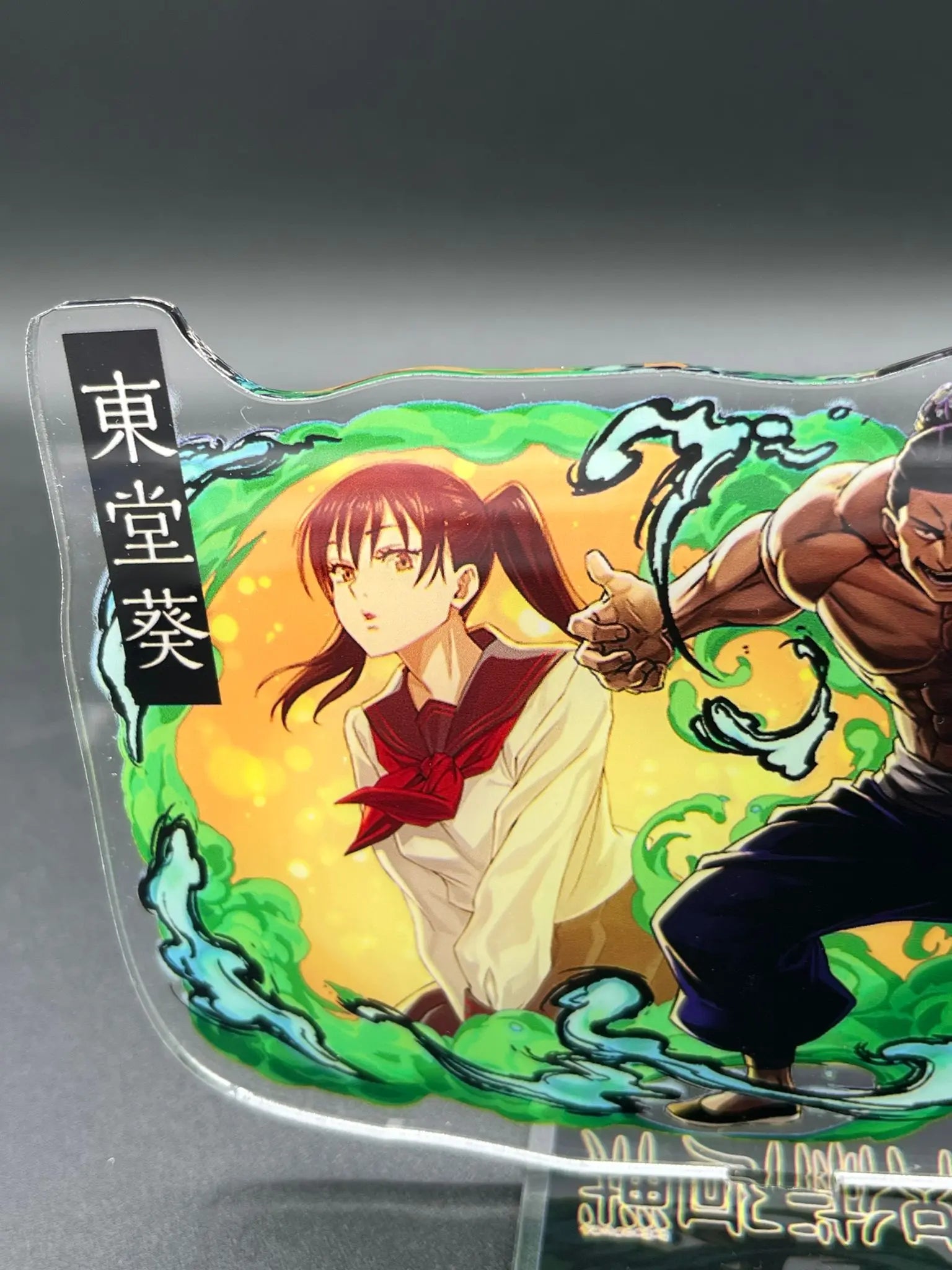 Close-up showing printing quality on the Aoi Todo and Nobuko Takada acrylic stand