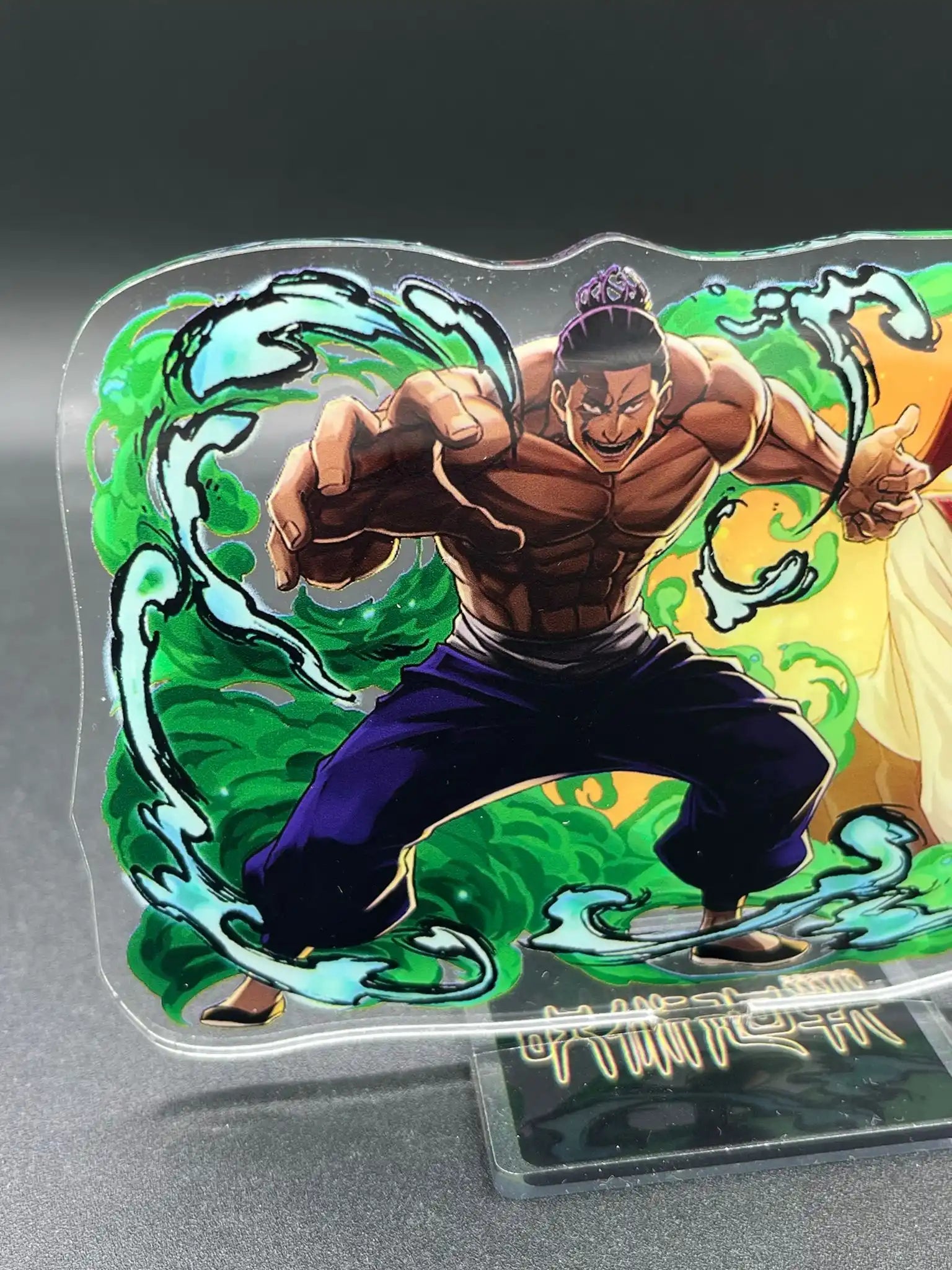 Additional close-up showing colors and artwork on Aoi Todo and Nobuko Takada acrylic display stand