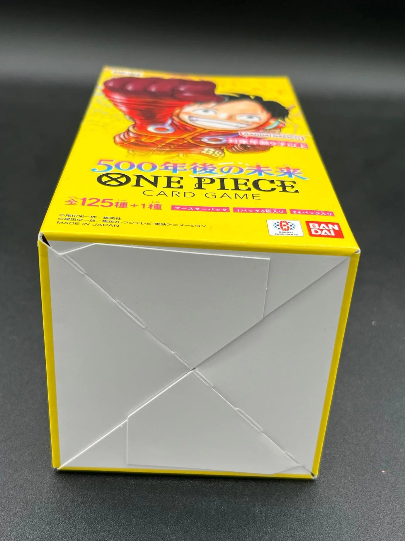 Bottom view of sealed One Piece Card Game Display OP-07, Japanese version